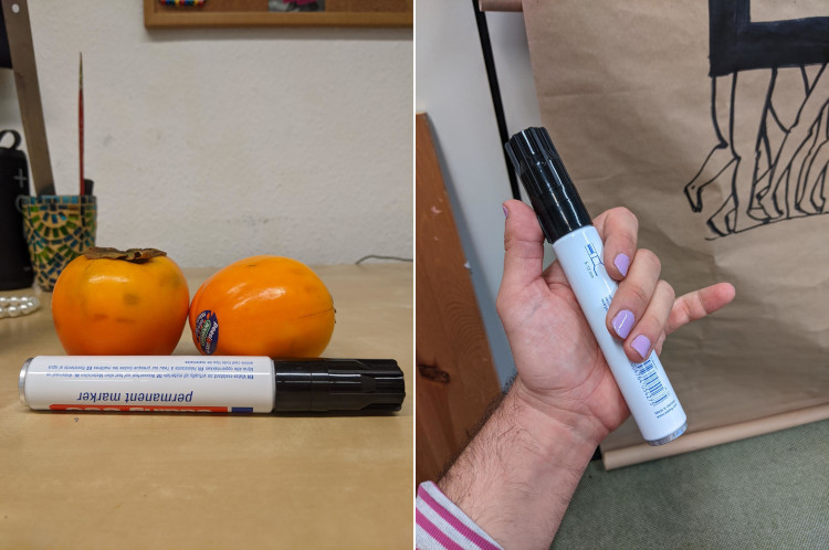 two views of a huge permanent marker, one next to two persimmons, one in my hand.